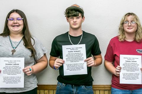 STUDENTS WIN LIFETIME HUNTING LICENSE. Jasmine Latham, Carter Schwarz, Sammy Nelson, Easton Wilkinson (not pictured), and Cade Cometti (not pictured) were the lucky winners at the Jonathan “Silver” Smith drawing recently. Each student received a lifetime hunting license from the Oklahoma Department of Wildlife. It is the hope of Jonathan’s friends and family that they will use this lifetime hunting license and not ever lose their love for hunting or the outdoors. They only ask that they remember Jonathan “S